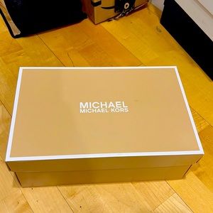 Michael Kors slip on shoes.